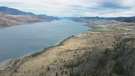 Stunning-View-of-Kamloops-Lake-in-a-desert-landscape-in-the-Nicola-Thompson-Region-in-BC-Canada-on-a-cloudy-day-in-summer