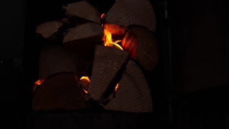 Pile-Of-Wood-Logs-Burning-For-Hot-Tub---close-up