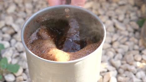 Close-up-of-Boiling-coffee-on-fire