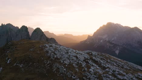 Beautiful-Drone-Flight-Over-Mountain,-Beautiful-Silhouettes-in-Background