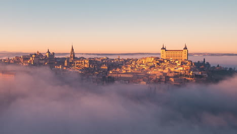 close-up-detail-timelapse-of-Toledo-imperial-city-during-sunset-with-low-clouds-fog-day-to-night