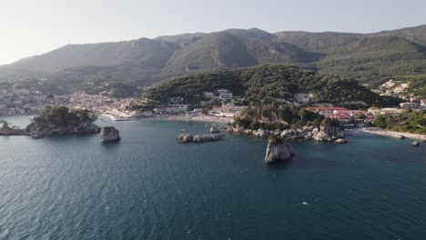 Aerial-Rising-Shot-Over-Ionian-Sea-With-View-Of-Parga-Coastline