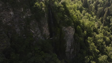 Sheer-Cliffs-With-Flowing-River-Mountain-In-Borjomi-Central-Park,-Georgia