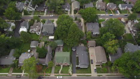 Flyover-and-tilt-down-over-houses-in-suburban-neighborhood-in-St