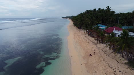 Drone-shot-of-beach-at-Bolinao,-Pangasinan,-Philippiines