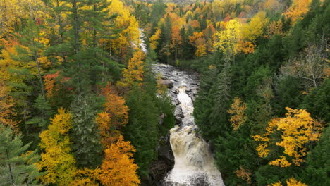A-drone-shot-of-the-hard-to-get-to-Sturgeon-River-falls-in-full-autumn-color