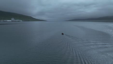 Orbiting-small-fishing-boat-in-Faskrudsfjordur-in-East-Iceland