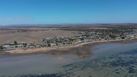 Drone-shot-of-small-coastal-town,-taken-during-low-tide,-near-Port-Broughton-on-the-South-Australian-Coast