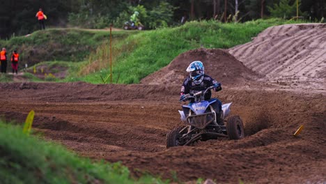 Quad-Bike-Race-Driver-coming-in-from-around-the-curve-during-the-race