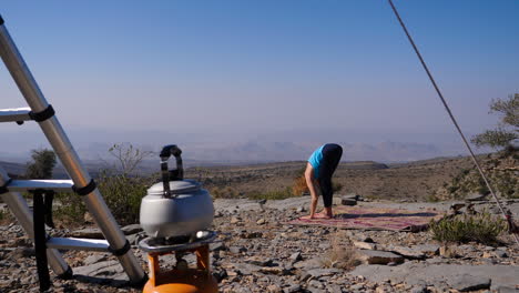Western-traveler-girl-practicing-outdoor-yoga-in-Oman,-different-poses-in-other-clips-available