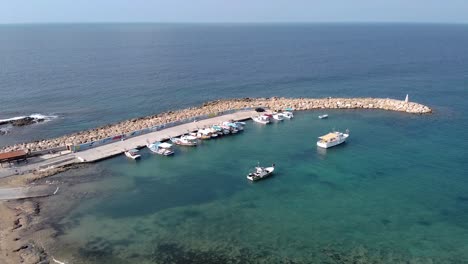Drone-shot-over-the-small-port-of-Agios-Georgios-Peyia-in-Cyprus