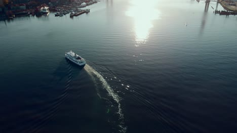 Aerial-static-view-of-boat-in-river-at-Gothenburg-Port-in-Sweden-during-the-day
