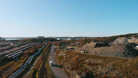 Aerial-Drone-Pedestal-Shot-of-road-in-Port-of-Gothenburg-during-the-day