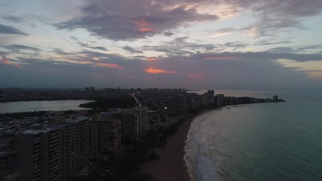 Isla-Verde-Puerto-Rico-sunsets-behind-clouds