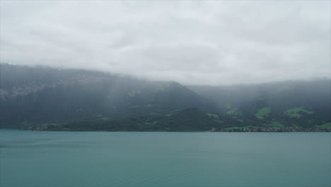 Timelapse-Thun-Lake-with-cloudy-on-hill-in-Switzerland