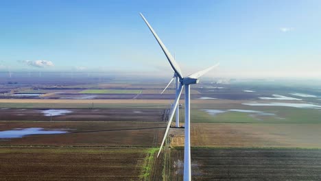 Una-Vista-Aérea-De-Turbinas-Eólicas-Que-Generan-Electricidad-Verde