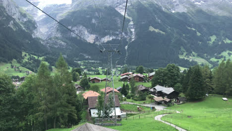 Beautiful-view-from-cable-car-moving-in-Grindelwald,-Switzerland