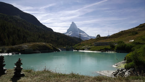 Timelapse-Matterhorn-with-alpine-lake,-Mosjesee-in-Zermatt,-Switzerland,-Europe