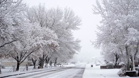 A-beautiful-winter-suburban-road-in-a-small-neighborhood-in-the-USA
