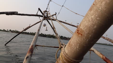 Close-up-of-view-of-fishing-net-apparatus-on-Arabian-Sea-in-Kerala,-India