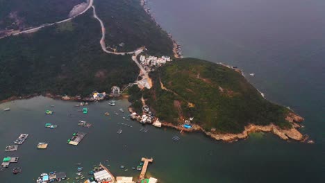 Chinese-Clearwater-Bay-with-rocky-coastline-and-marina,-aerial-shot