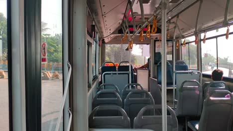 Empty-bus-turning-on-signal-very-few-passenger