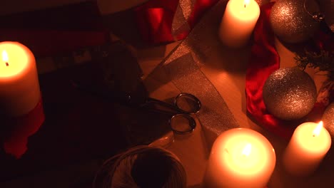 Christmas-background-with-candles-and-other-wrapping-equipment
