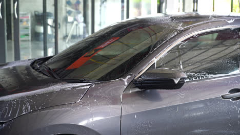 washing-car-with-foam-in-carcare