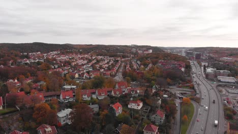 Aerial-Shot-of-Bird's-Murmuring-over-Gothenburg-City-during-cloudy-day