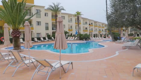 A-panning-view-of-the-BH-Mallorca-with-its-pool-and-chairs-with-no-people-is-the-place-to-stay-and-be-seen-in-MAGALUF,-the-party-capital-of-the-World