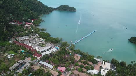 Aerial-View-on-Pier-and-Hotel-Resorts-on-Exotic-Tropical-Beach-and-Island,-Railay,-Krabi,-Thailand