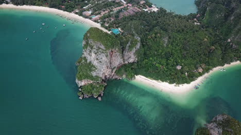 Magical-Coastline-of-Thailand,-Drone-Aerial-View-of-Exotic-White-Sand-Beach-and-Rainforest-over-Cliffs-on-Tropical-Sea