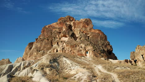 Stone-houses-carved-in-Goreme-landscape,-Turkey