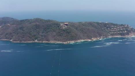 Aerial-View-on-Zipline-Cables-and-Cape-With-Landing-Zone,-Acapulco-Mexico