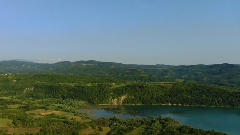 Lake-Butoniga-dam-water-reservoir-in-Croatia-Istria-peninsula,-Aerial-drone-approach-shot