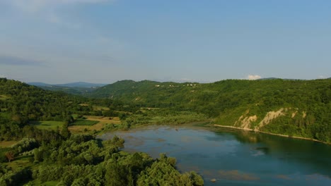 Approaching-Lake-Butoniga-water-dam-in-Croatia-Istria-peninsula,-Aerial-drone-closing-in-shot