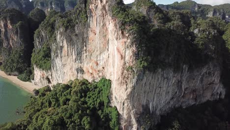 Limestone-Cliffdrop-Over-Sea,-Typical-Landscape-of-Thailand-Coast,-Drone-Aerial-View-of-Railay-Beach,-Krabi