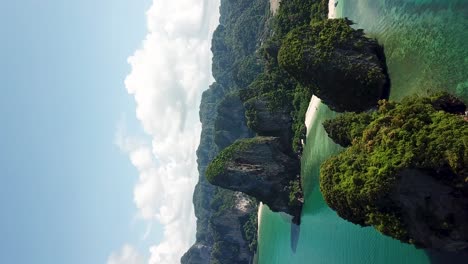 Vertical-Aerial-View-on-Majestic-Landscape-of-Thailand,-Sea-Cliffs-and-White-Sand-Beach-Lagoon,-Krabi-Island