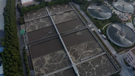 Aerial-view-of-water-treatment-plant-with-dirty-water-pools-in-Guangzhou,-China,-Asia