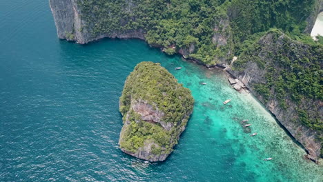 Aerial-View-of-Magnificent-Lagoon-and-Coral-Reefs-Under-Cliffs,-Other-Side-of-Maya-Bay,-Phi-Phi-Island,Thailand