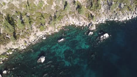 Lake-Tahoe-on-California-Nevada-State-Line-USA,-Top-Down-Aerial-View-on-Rocky-Coast-and-Fresh-Clear-Alpine-Water