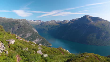 Aerial-view,-norwegian-fjord-being-revealed