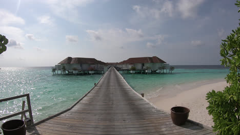 walking-with-bungalow-in-ocean-sea-at-Maldives