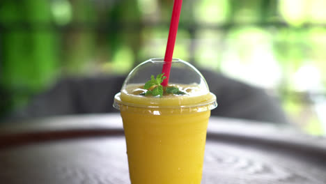 fresh-mango-smoothies-glass-in-cafe-restaurant