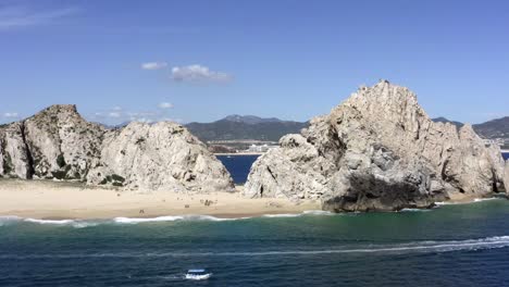 Aerial-View-on-Lands-End-Limestone-Rocky-Formation-and-Natural-Arch-on-Cabo-San-Lucas-Riviera,-Mexico-With-Lovers-and-Divorce-Beach