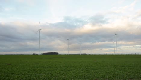 Windmill-farm-on-a-cloudy-evening.-Sustainable-energy