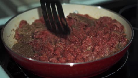 Raw-and-Cooked-Ground-Beef-in-Red-Pan
