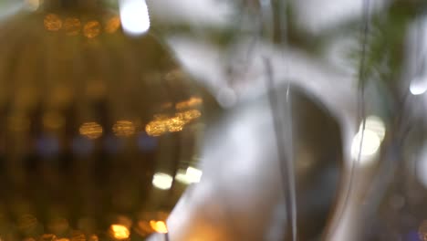 Abstract-Christmas-background-defocused,-tilting-up