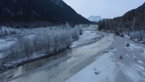 Anamorphic-4K-Aerial-Drone-footage-of-the-scenic-Rissach---Isar-river-in-the-Bavarian-alps-near-lake-Sylvenstein-and-lake-Walchensee-in-southern-Germany-in-the-snowy-mountains