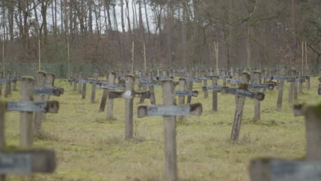 Slow-pan-over-large-abandoned-graveyard-with-old-crucifixes